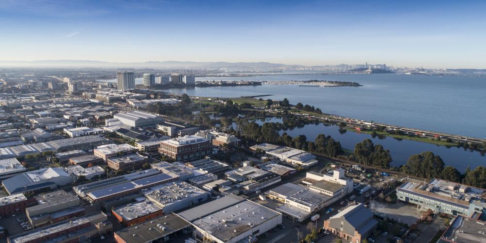 Alameda Island in the foreground, with the San Francisco Bay, the Bay Bridge and San Francisco in the distance.