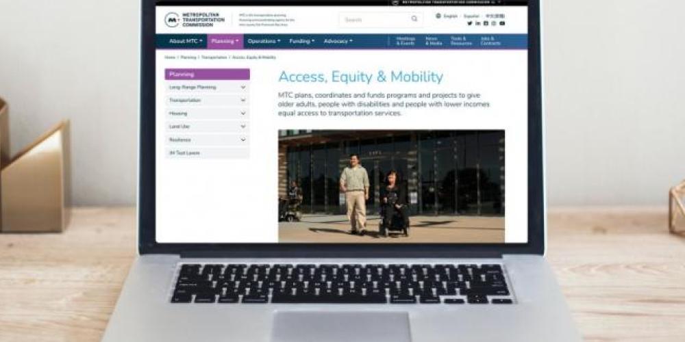a laptop with the new website displayed