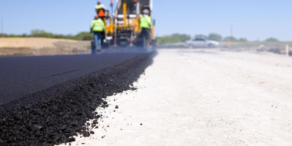 Paving a road.