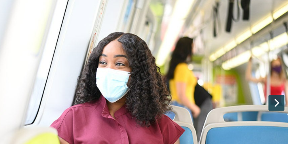 Woman riding public transit