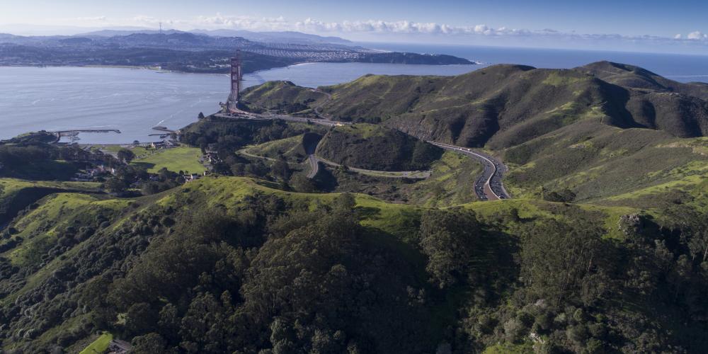 Aerial view of Marin County, the Golden Gate Bridge, San Francisco, the San Francisco Bay and the Pacific Ocean.