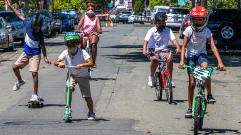 kids playing on bikes