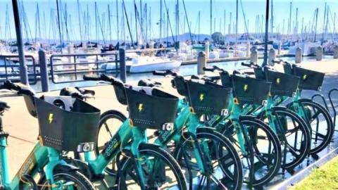Bikes along a harbor