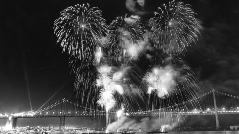 Fireworks exploded in the night's sky above the San Francisco-Oakland Bay Bridge's West Span.